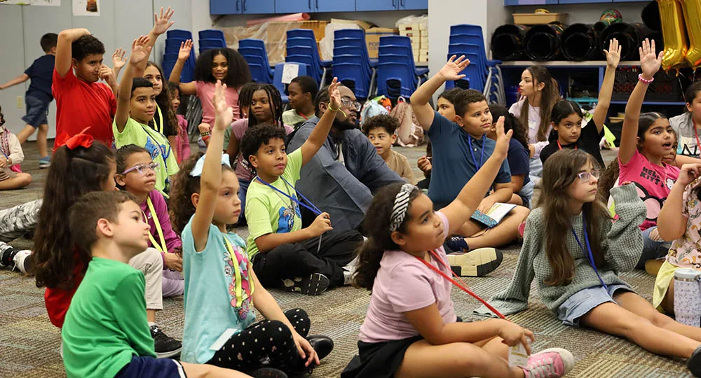 Children and leaders serving together